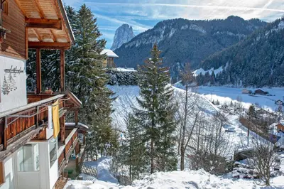 a view from a house in the snow at Apartment Soval in Ortisei