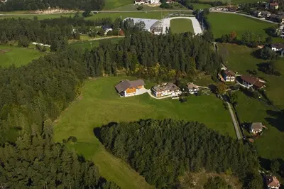 an aerial view of a large estate with houses at Appartments Neuhof in Collalbo