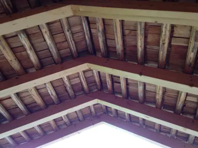 an overhead view of a wooden ceiling in a barn at Apartments Serghela in San Cassiano