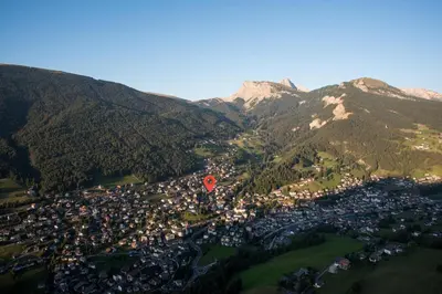 an aerial view of a town in the mountains at AppartChalet LA RONDULA - 100m from Seceda in Ortisei
