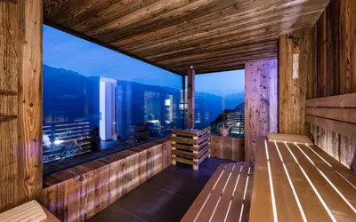 a room with a large window with a city view at Chalet in Naturno