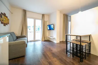 a living room with a couch and a table at Apartment Vanga in Bolzano