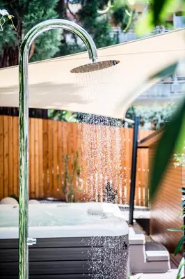 a bathtub with a water fountain at Villa Helvetia in Merano