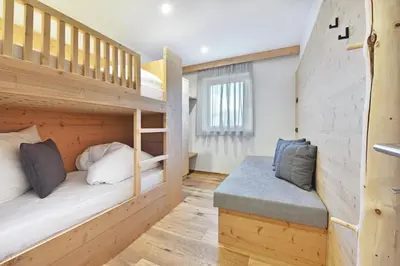 a bunk bed room with two bunk beds at Forchnerhof Panorama- Rienzschlucht in Rodengo