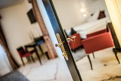 a door with a view of a living room at Hotel Restaurant Kirchsteiger in Vollan