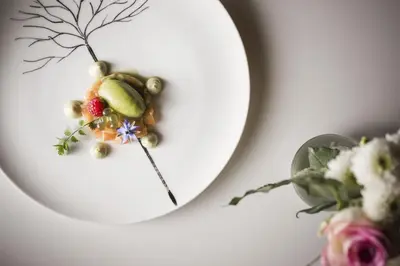 a mirror with a decoration of fruits and vegetables at Boutique Pension Erlacher - Adults Only in Villandro
