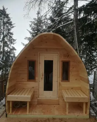 a large wooden sauna with two benches in front at Kaserhof wandern- Alleinlage - ruhig- top Aussicht in Bressanone