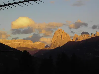 a view of a mountain range with clouds in the sky at Gspoi-Hof in Laion