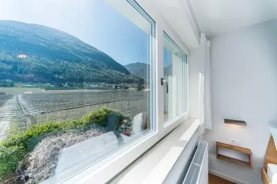 a room with a window with a view of a field at Apartment Le rose di Marianne - ovest in Varna