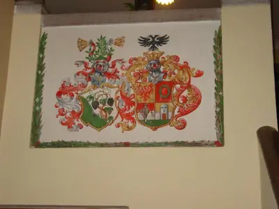 a painting of a crest on a wall at Plonerhof in Lagundo