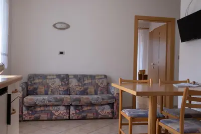 a living room with a couch and a table at Ferienwohnung im Haus Texel III in Parcines