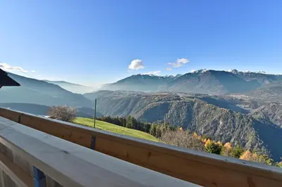 a view of the mountains from the balcony of a house at Forchnerhof Panorama - App 3 Täler Blick in Rodengo