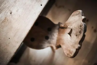 a piece of wood on a wooden table at Huberhof in Fiè