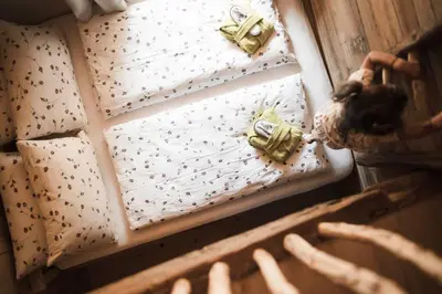 an overhead view of a bed with butterflies on it at Huberhof in Fiè
