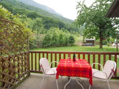 a table with a red and white checkered table cloth at Haus St. Valentin in Appiano sulla Strada del Vino
