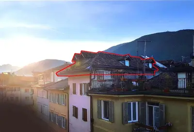 a group of buildings with a red line on top of them at Ugo Art Lodge Bright in Bolzano