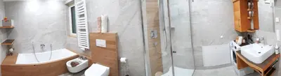 a bathroom with a sink and a shower and a toilet at Chalet Schwarzenstein in Campo Tures