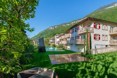 a view of the courtyard of a hotel at Überbacherhof in Termeno