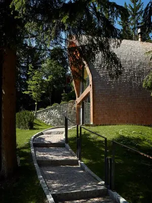 a stone path leading to a brick building at Mi Chalet in La Villa