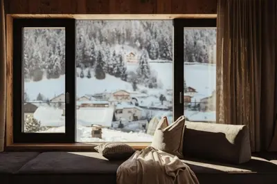 a building with a view of the mountains at Luxury Chalet Milé in Ortisei