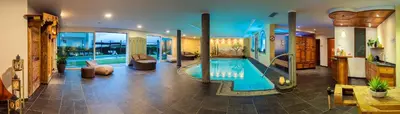 a large house with a swimming pool in it at Villa Residence Franziskus in Tirolo