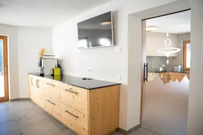 a kitchen with a sink and a counter top at Chalet Fisti in La Villa