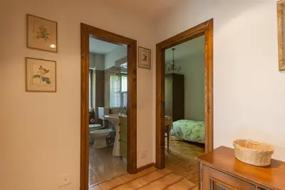a hallway with a door leading to a bedroom at Casa Elena in Canale dʼAgordo