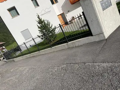 a wrought iron fence in front of a house at Oberkircher in Fundres