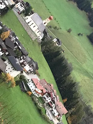 a group of houses in a grassy field at Oberkircher in Fundres