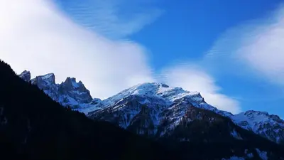 a view of a snow covered mountain range at Sport Hotel Cristal in Falcade