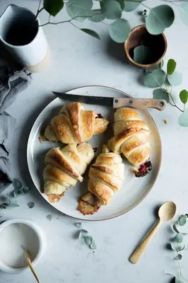 a plate of pastries sitting on a table at Your secret place to stay - Therme Meran in Merano