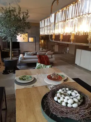 a living room with a table with eggs on it at Your secret place to stay - Therme Meran in Merano