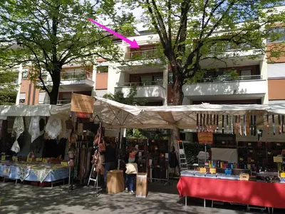 a book market in front of a building at Appartment Trojer in Merano