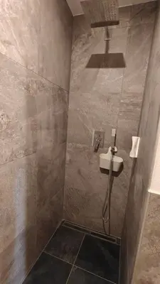a bathroom with a sink and a shower at Schlossberg in San Leonardo in Passiria