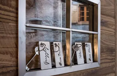 a window with a bunch of keys on it at Grizzly Haus & Frosch Restaurant - Teritoria in Varena