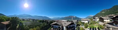 an aerial view of a village in the mountains at Garni Pöhl in Tirolo