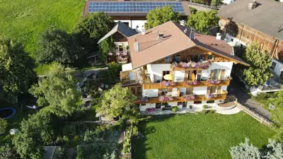 an overhead view of a building with a roof at Kastnerhof in Meltina