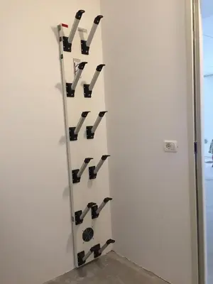 a wall with lots of pairs of clippers at Casa Chris by AMA Val di Fassa in Pozza di Fassa