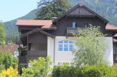 a large house with a brown roof at Villa Grünewald in Siusi