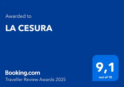 a blue rectangle with the text awarded to la censusara at LA CESURA in Carano