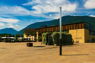 a building with a pole in front of it at Apartment Terme in Merano