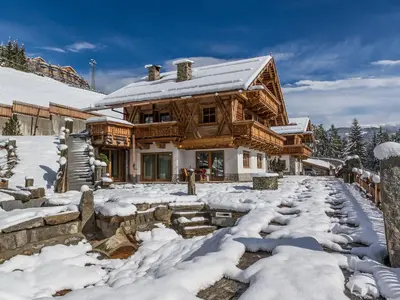 a garden with a gazebo and a pool at Chalet Piz da Peres in Valdaora