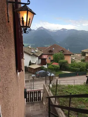 a street light on the side of a building at Appartamento Pezzol in Daiano