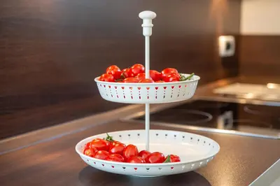 a bowl of tomatoes sitting on top of a counter at Apartment Maximilian in Merano