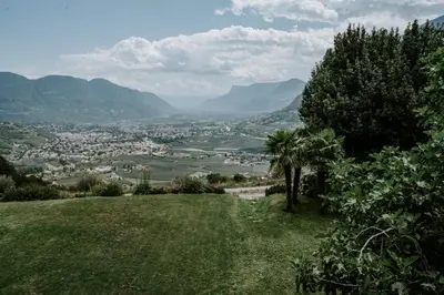 a view of a city from a hill at Arua Private Spa Villas in Merano
