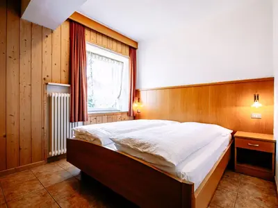 a bathroom with a shower and a toilet and a sink at Apartment Cincelli by Interhome in Pozza di Fassa