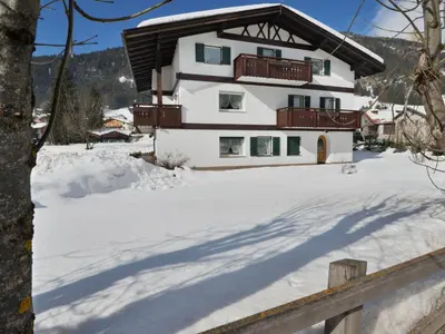 a pile of snow in front of a building at Apartment Cincelli by Interhome in Pozza di Fassa