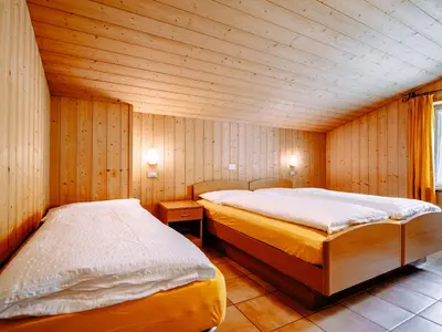 a house with a balcony on top of it at Apartment Cincelli - Marmolada by Interhome in Pozza di Fassa