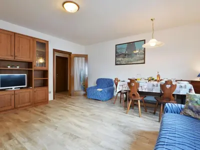 a balcony with snow covered mountains in the background at Apartment Bernard-1 by Interhome in Campestrin