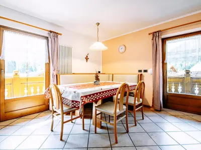 a dining room with a table and chairs at Apartment Carmen-2 by Interhome in Soraga